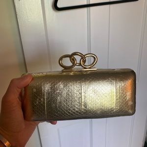 Diane Von Furstenberg gold clutch